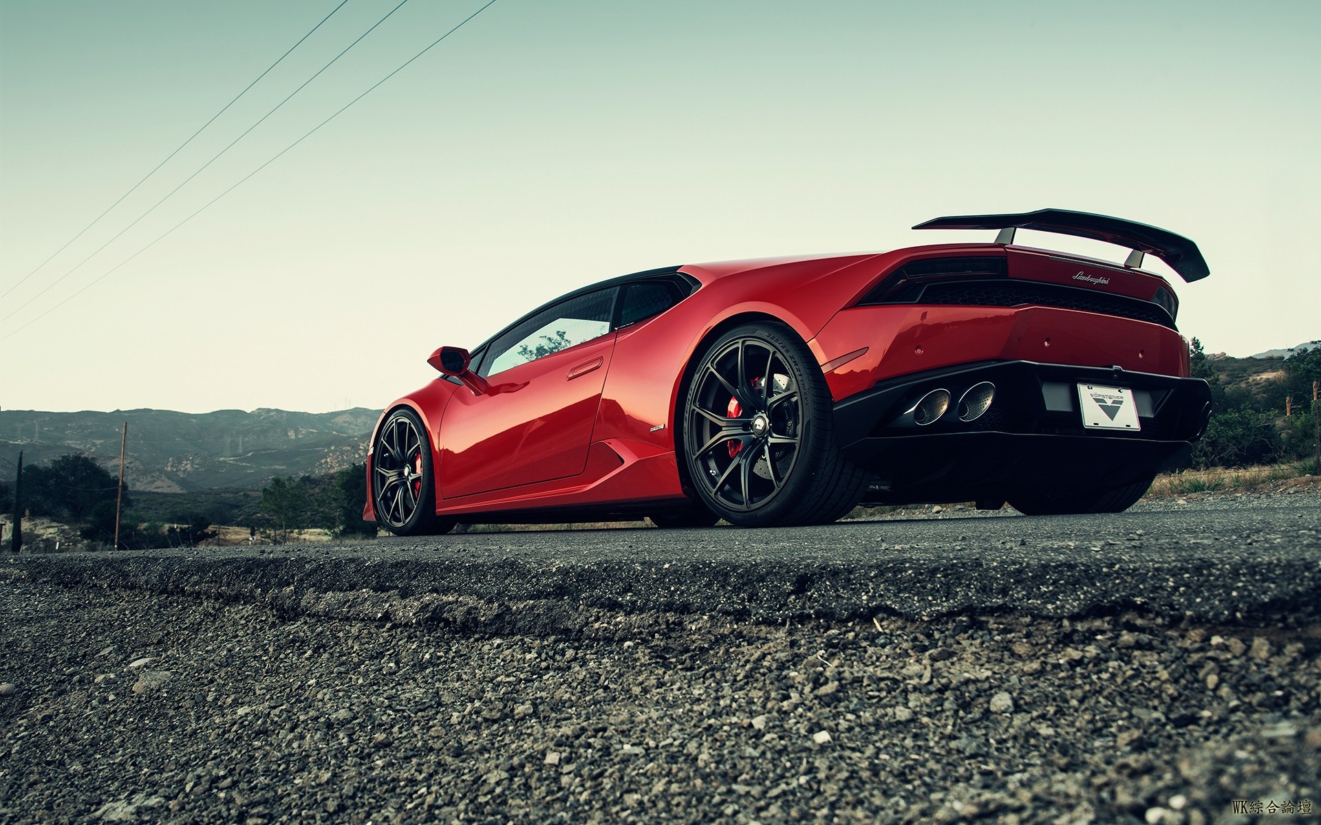 lamborghini_huracan_red_side_view_106558_1920x1200.jpg